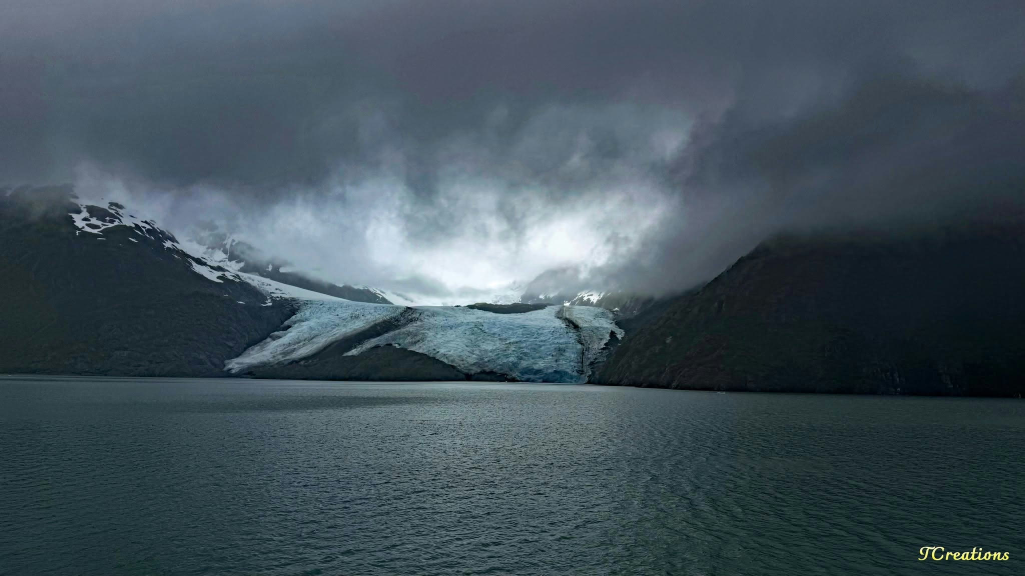 A storm breaking over a tidewater glacier